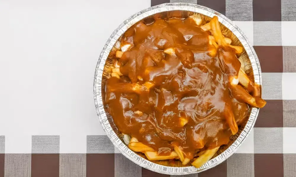 Classic Canadian poutine at Canadian Unlimited Pizza House in Winnipeg, MB